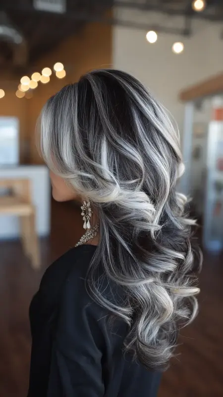 Enchanting Waves with Dazzling Silver Accents - Silver highlights on dark hair